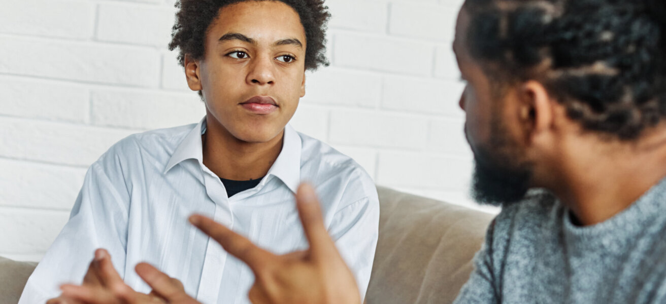 father son family man child conversation talking parent boy discussion communication together male togetherness bonding care lifestyle home childhood talk love dad