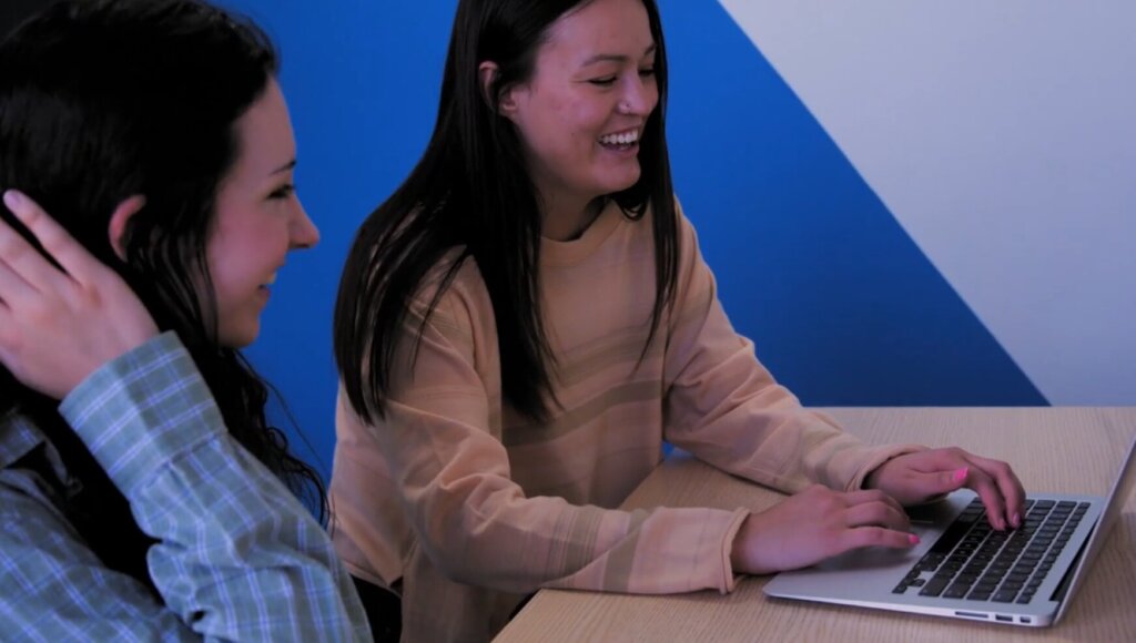Emiko & Student Laptop Smiling (1)